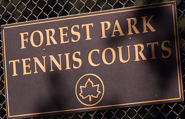 tennis courts sign