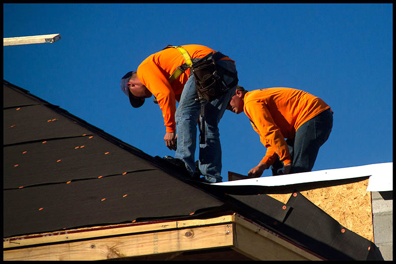 roofers at work